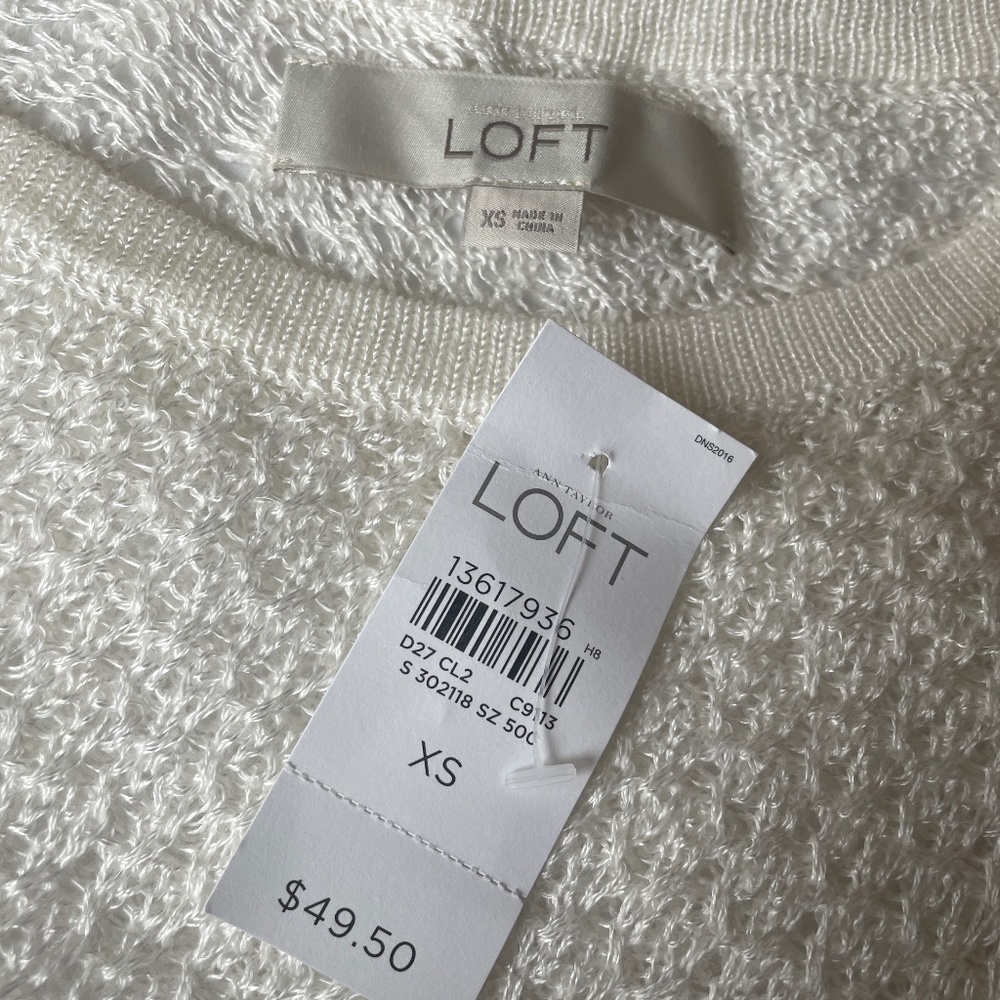 Ann Taylor knit top in white.